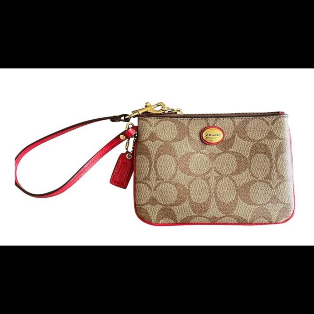Brown and red Coach wristlet